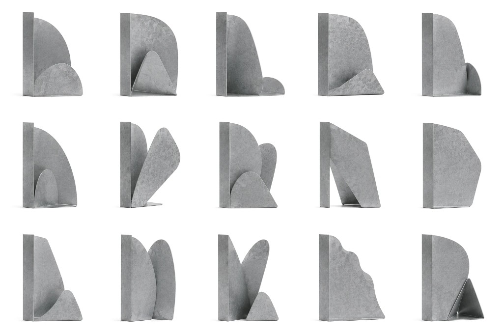 PCSB steel bookend on a white shelf beside a row of books — Philip Cronerud